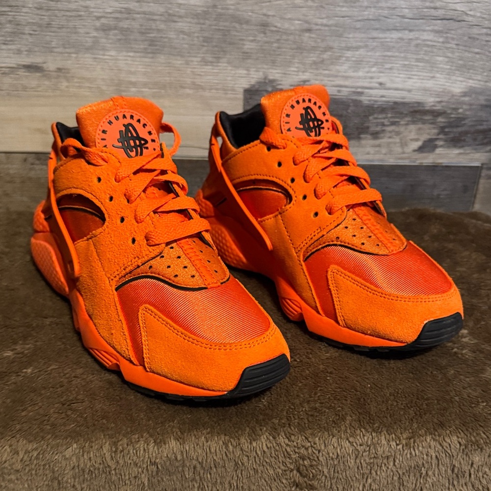 Vibrant Orange Women’s Nike Huarache Sneakers